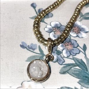 New small white geode necklace on elastic string with gold colored